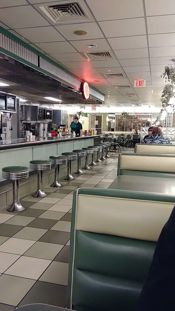 Casual dining room with tables and retro decor.